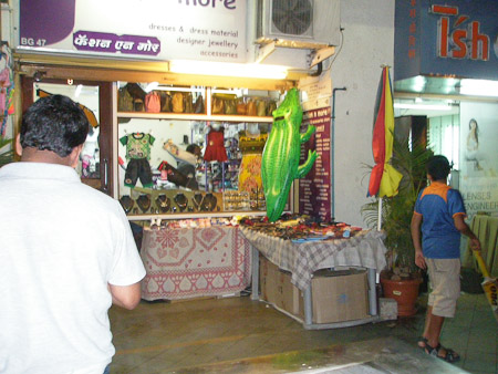 Kids' clothes with alligator and inspirational books, Pune
