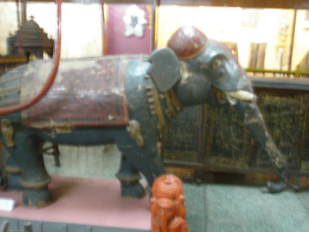Elephant pulling palanquin